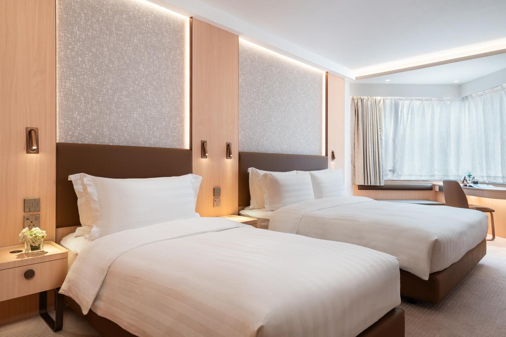 Newly Renovated Deluxe Room with One Double Bed and One Single Bed